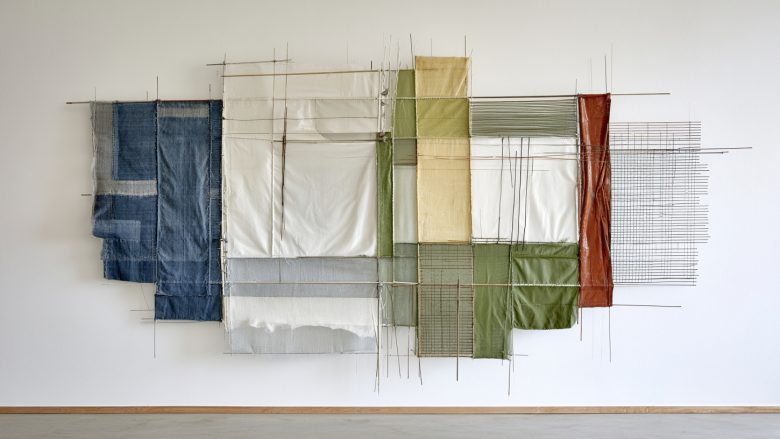 Textile assemblage artwork representing the open-source Manifesto version 1.0